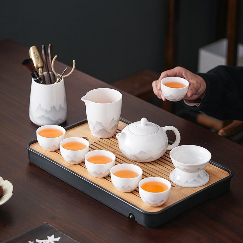 Ink and Wash Suet Jade Tea Set, Advanced Dehua White Porcelain, a Complete Set of Teacups for Customers, and a Corporate Gift Box.