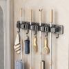 Wall-Mounted Mop Holder No-Drill Bathroom Organizer With Adjustable Clips Hooks Mops Brooms Storage