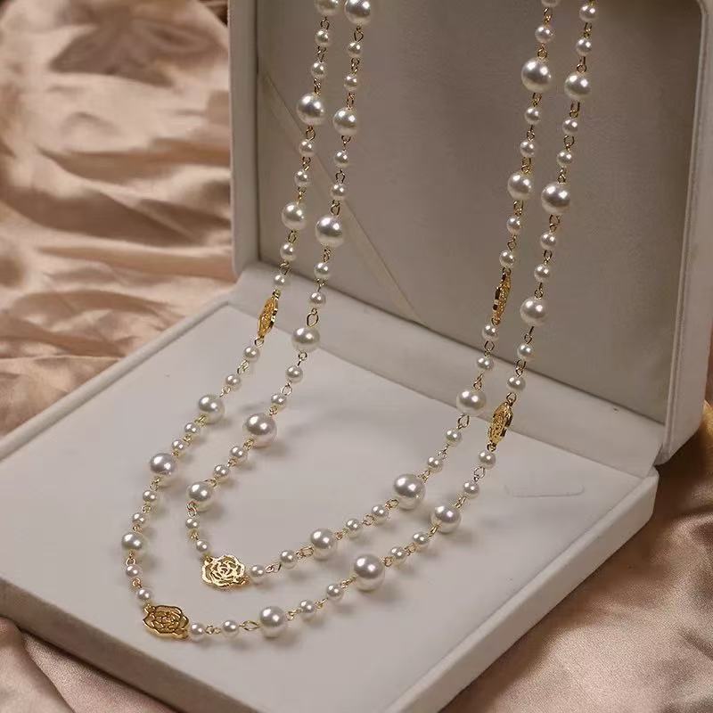Hot-selling sweater chain four-leaf clover double-sided long necklace long temperament gothic trinket double-layer pearl