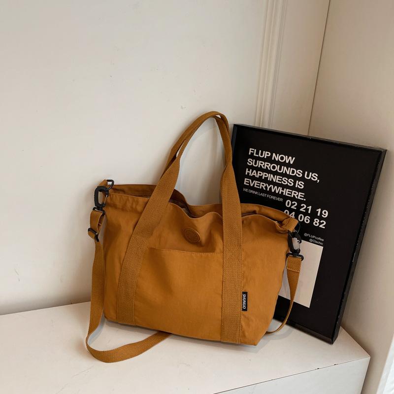 

Simple literary cloth bag, women s work portable shoulder bag, large-capacity casual messenger tote bag one size fits all коричневый
