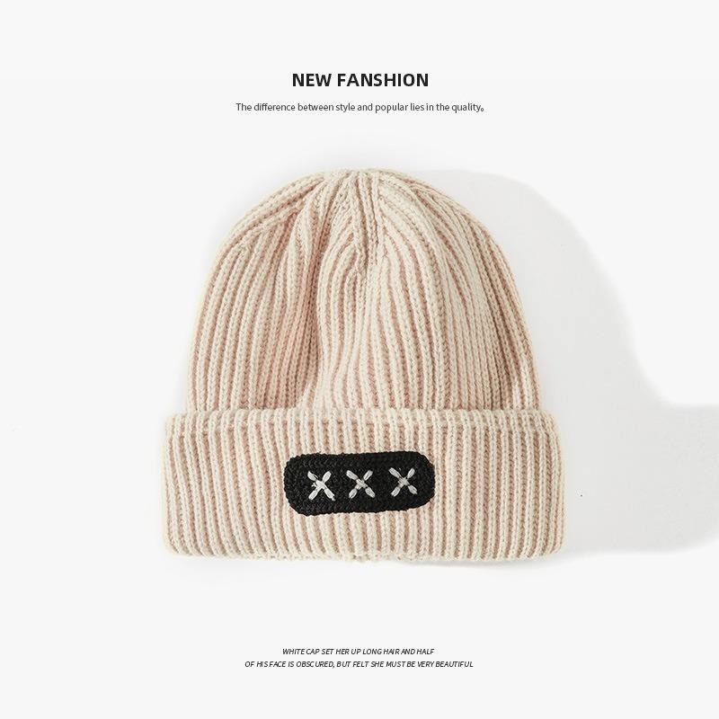 

Parent-child autumn and winter knitted hat xxx cloth label hat fashion trend simple solid color cold and warm wool hat tide Child 48-52cm