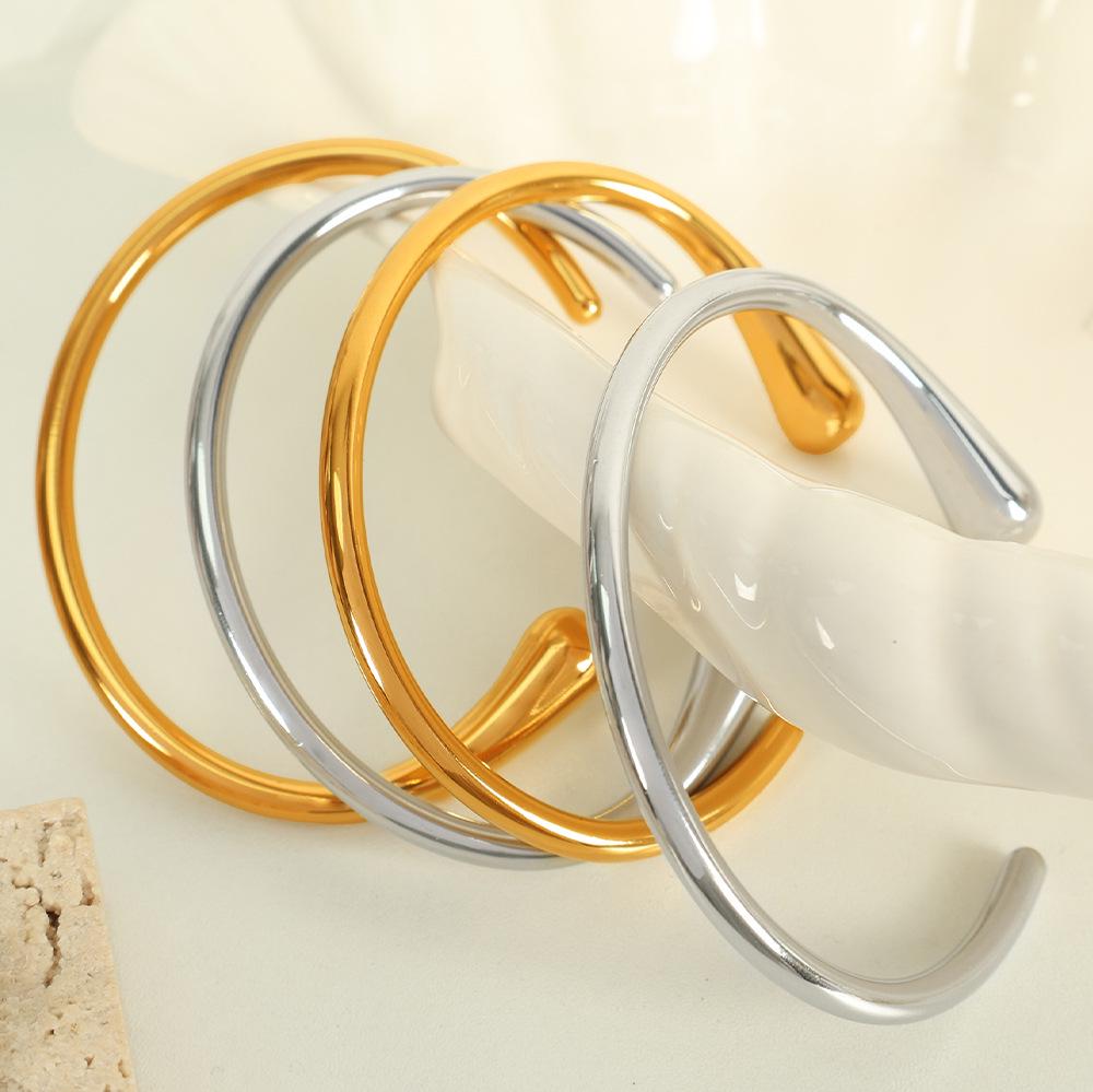 

Minimalist Open Teardrop Bangle: Titanium Steel Mirror Polished Bracelet for Women