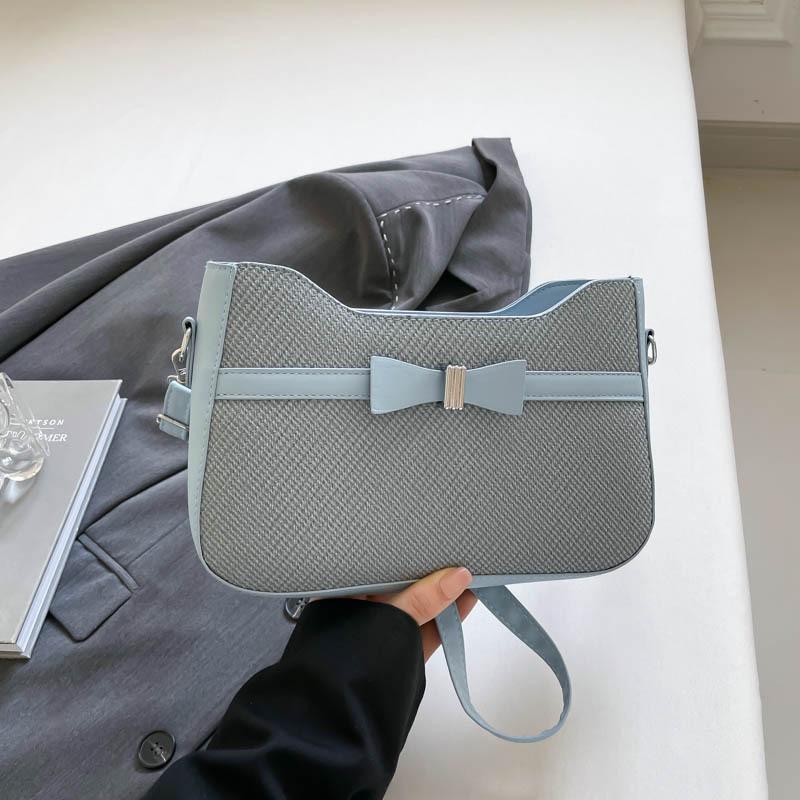 

Retro commuter texture simple bag women s 2025 spring new armpit bag versatile single shoulder crossbody baguette bag синій