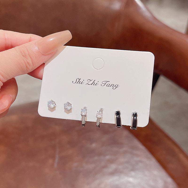 S925 Silver Korean Zircon Earrings with Black Drip Glaze and Buckle Design