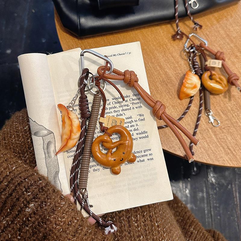 Yogodlns Cute Smiling Face Bread Woven Rope Dumpling Pendant Bag Accessory Handmade Trendy Bag Hanging Alkali Water Bread Bagel Bag Pendant