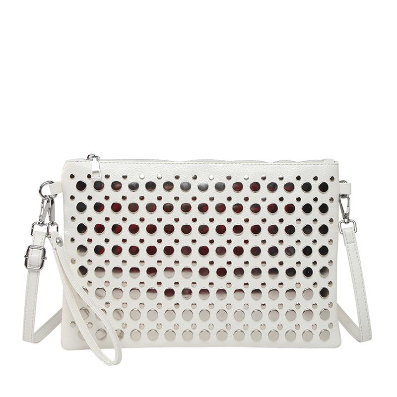 

Женская сумка для внешней торговли 2025 осень новая корейская версия модная сумка через плечо с заклепками большая вместимость повседневная универсальная сумка-конверт тренд