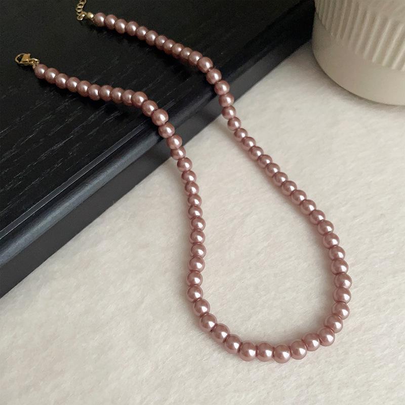 

Позолочений цирконовий кулон-літера перлове намисто - Елегантний та універсальний ланцюжок на ключицю для жінок у стилі легкої розкоші