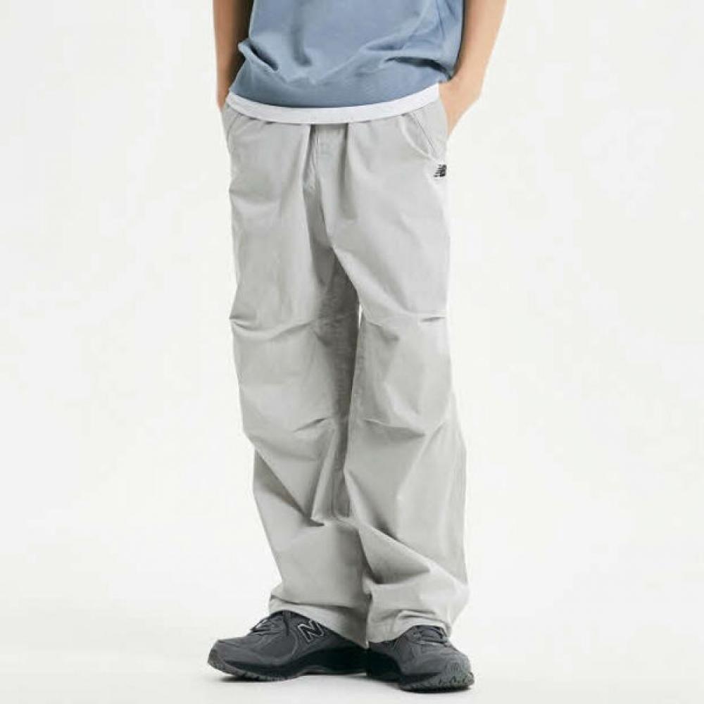 

New Balance Pants Lqj Nbnte21023 16 Uni Essential Wide Parachute Pants 85