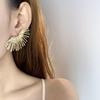 Sunflower Punk Fan-Shaped Stud Earrings: European & American Cross-Border, Metal Cold Style, High-End, Exaggerated Women's Personality Accessory.
