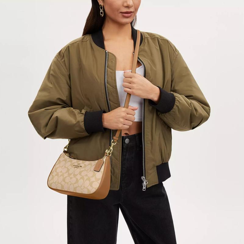 Coach Borsa a tracolla Teri 24 chiusura a zip classica presbiopica, logo firmato, tela e pelle liscia, borsa da mano, taglia media, stile donna
