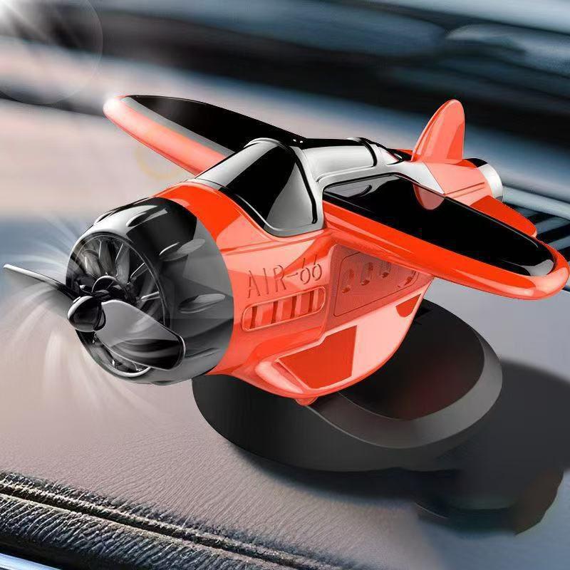 

Украшение на приборную панель автомобиля в виде вращающегося самолета на солнечной батарее, 360° автоматически вращающийся декоративный авиационный аксессуар для интерьера автомобиля Orange-red