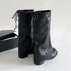 Schwarze Trageriemen-Nischendesign hohe Zigarettenstiefel Damen 2025 neue Frühling und Herbst Retro hohe Stiefel