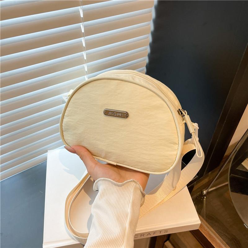

2025 new nylon cloth shell bag Korean simple messenger bag change bag casual beautiful foreign style shoulder bag