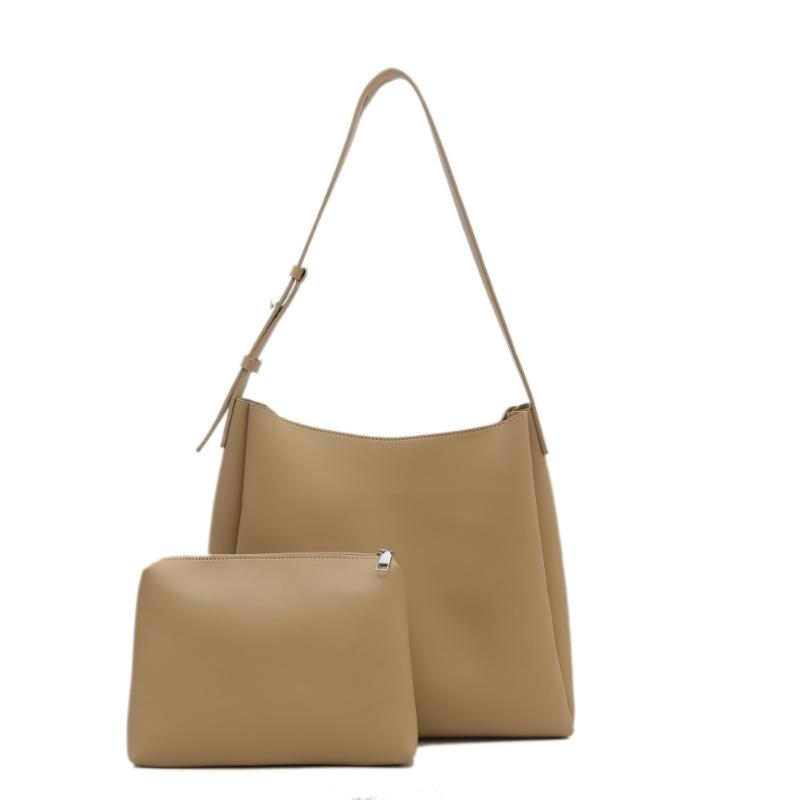 Large-capacity commuter bag women's spring new child and mother bag retro fashion soft leather shoulder bag portable tote bag