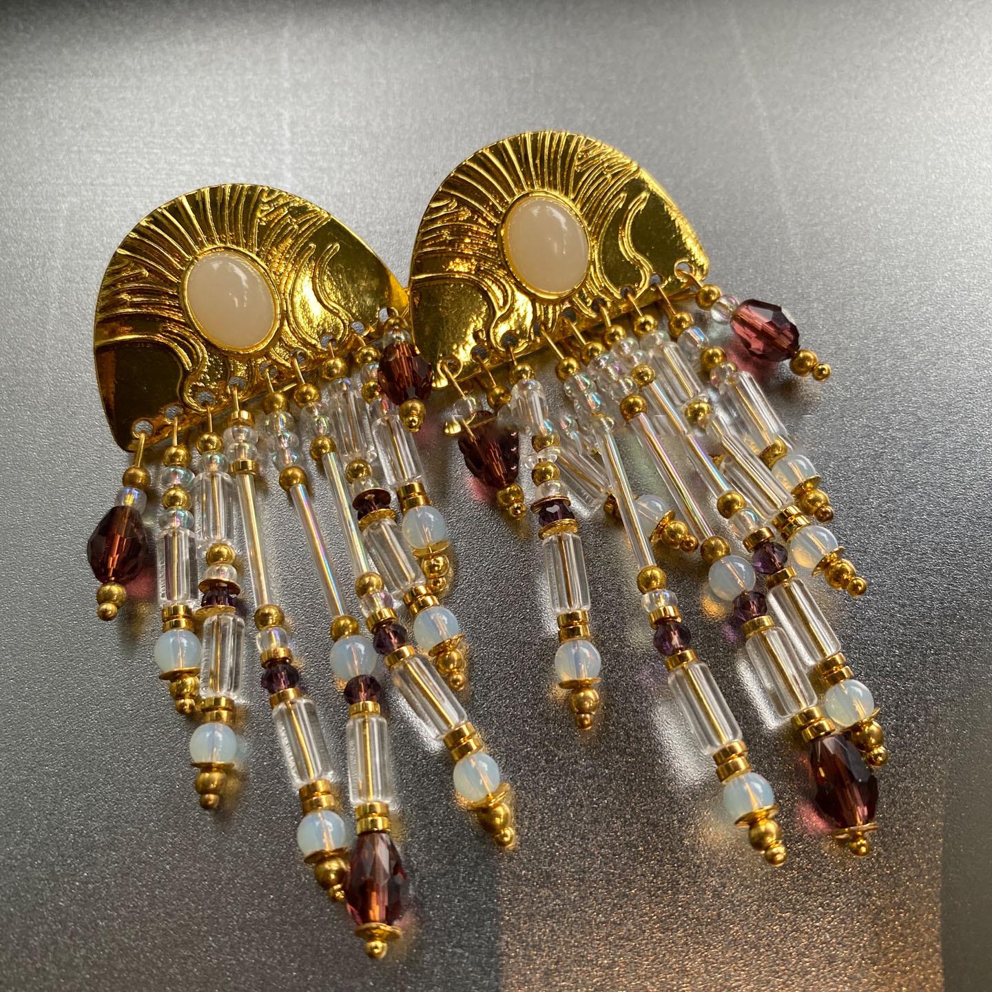 

Silver Needle Geometric Oval Glass Tassel Earrings - Luxurious High-End Studs, European & American Style, Unique Statement Ear Ornaments.