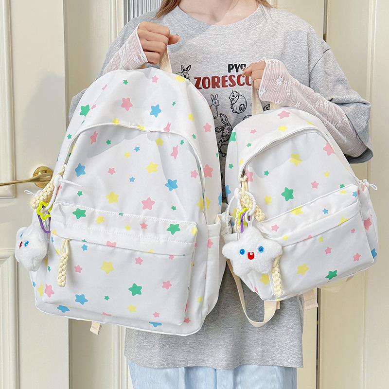 Schoolbag schoolbag junior high school girls ins girls heart stars travel small backpack large capacity simple dopamine backpack women