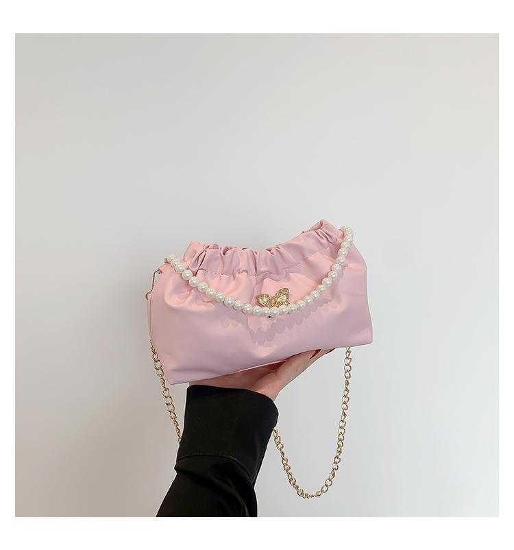 

Popular bag women s new 2024 high-end niche shoulder bag versatile pearl chain messenger cloud small bag рожевий