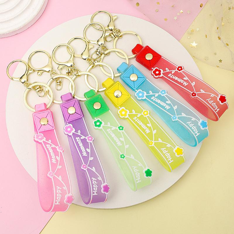 Transparent Pvc Soft Rubber Rope Keychain English Small Flower Jelly Color Plum Blossom Candy Color Drop Adhesive Wristband