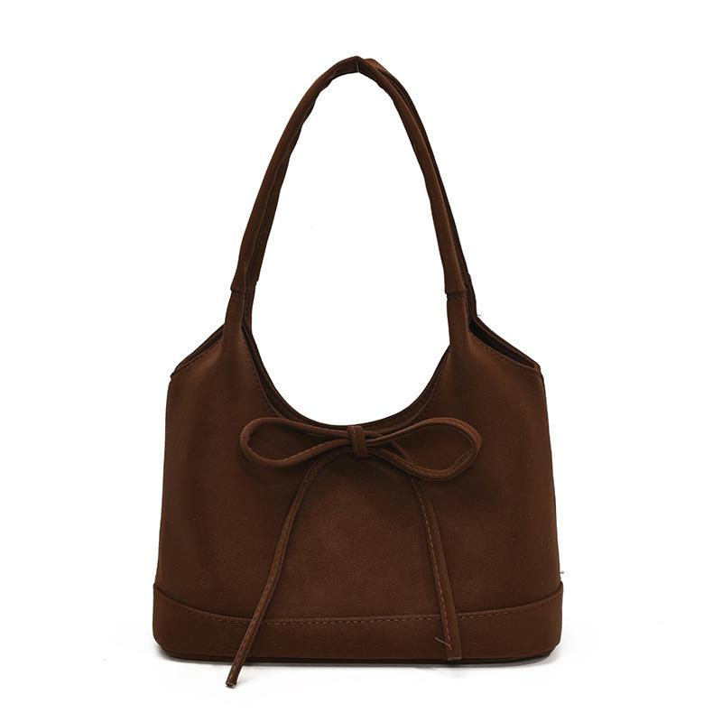 New product trend Korean sweet style niche bow portable bucket bag literary sense commuter versatile shoulder bag