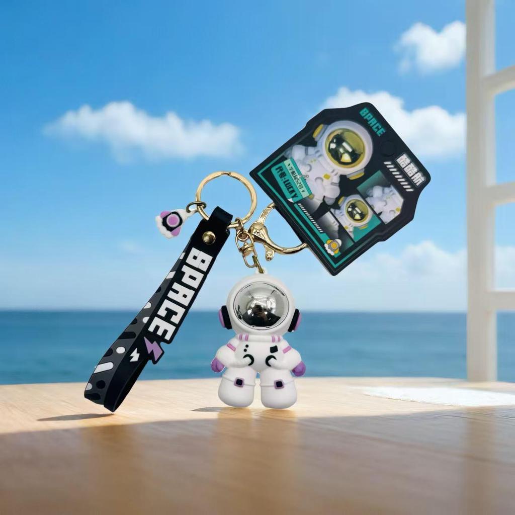 Genuine Astronaut Keychain: Adorable Spaceman Pendant for Couples, Car Keys, Backpacks, and Gifts