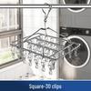 Stainless Steel Multifunctional Windproof Sock and Clothes Hanger with Clips for Home and Dorm Use.