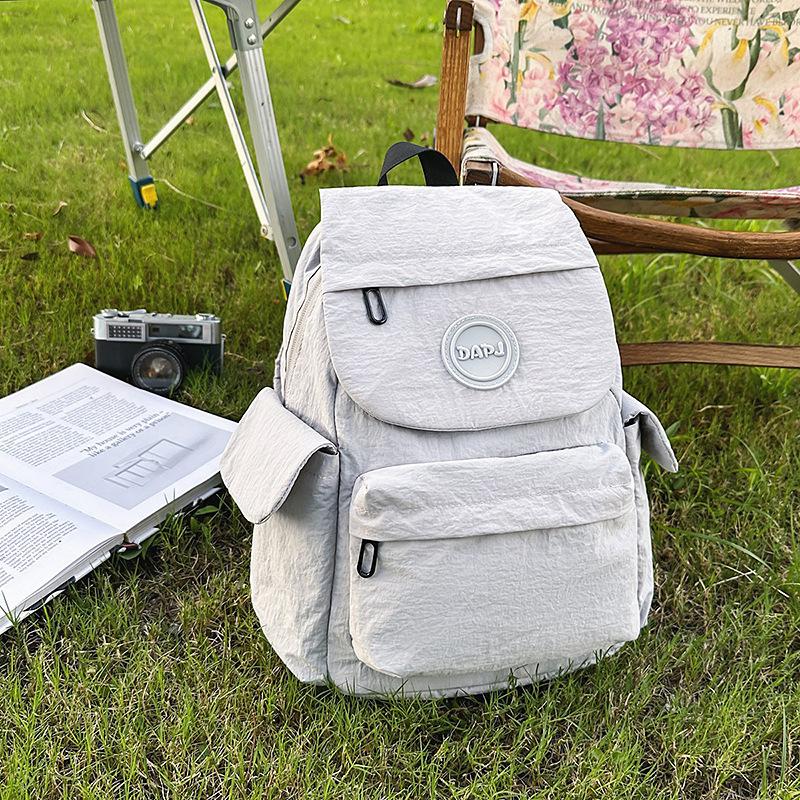 

Lightweight, fashionable and large-capacity schoolbag, backpack, simple college student versatile new travel back bag