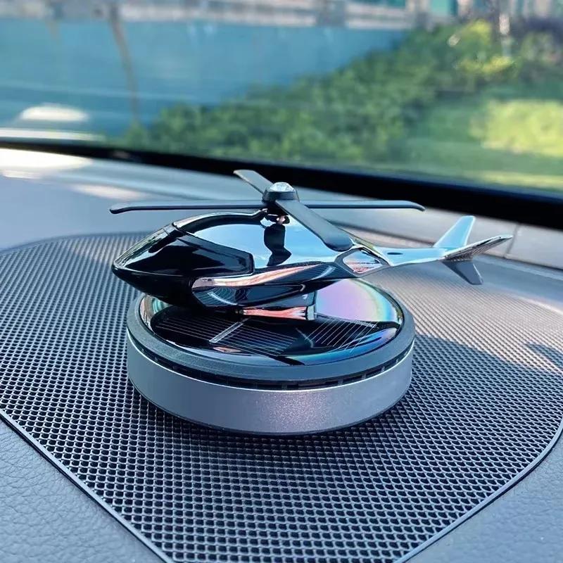 Car perfume decoration Solar rotating aircraft creative personality car console decoration supplies