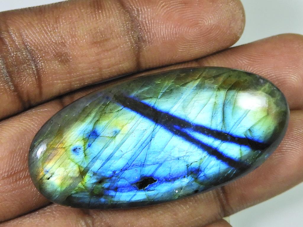 96 cts. Labradorita natural multifuego, cabujón ovalado suelto, 23 x 51 x 8 mm, SK-1173