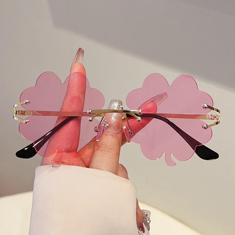 New European and American fashion borderless green clover sunglasses seaside holiday party sunglasses women