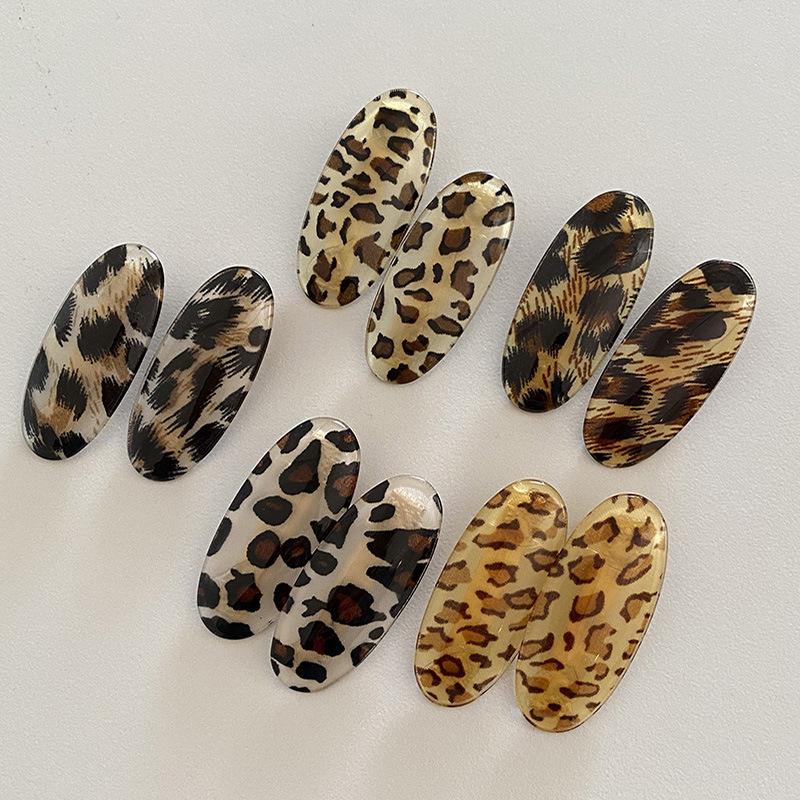 Korean version of retro fashionable leopard print seamless oval hairpin personalized versatile makeup edge clip hair accessories