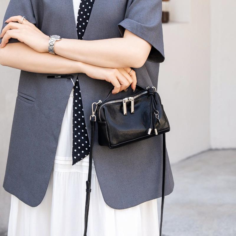 Cross-border new bags, first-layer cowhide women's bags, casual fashion handbags, commuter messenger bags, versatile shoulder bags.
