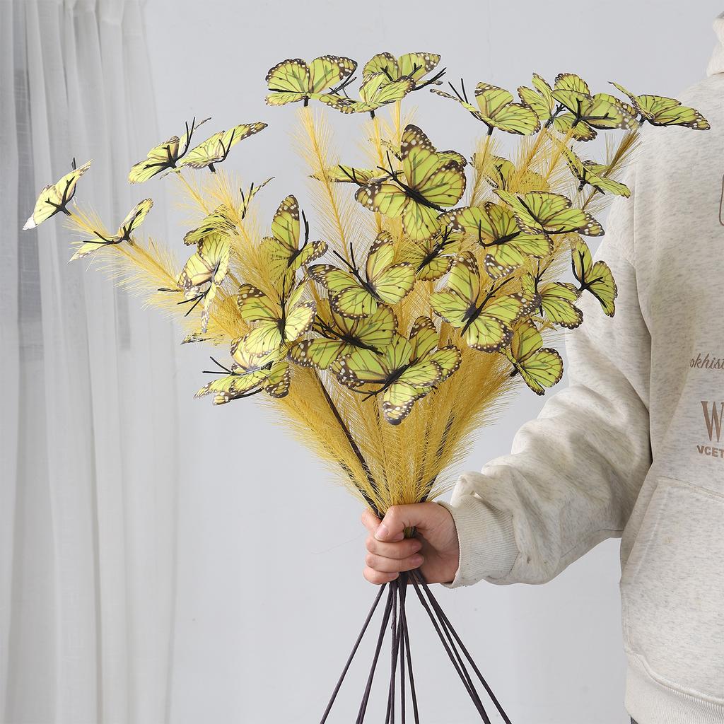 An artificial butterfly branch used for weddings, family offices, parties, decorating vases, and floral arrangements