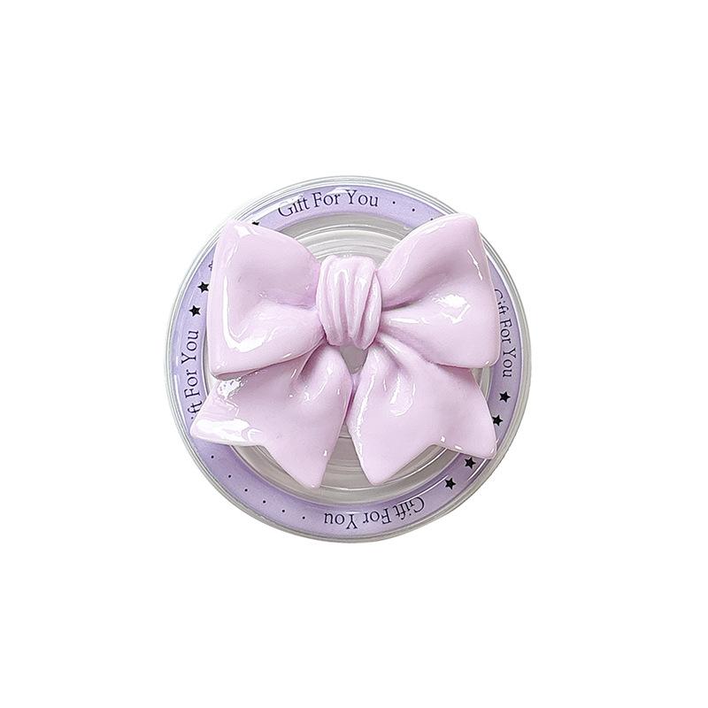 Solid Color Bow Magnetic Suction Mobile Phone Airbag Bracket Wind Desktop Retractable Bracket Watch Drama Creativity