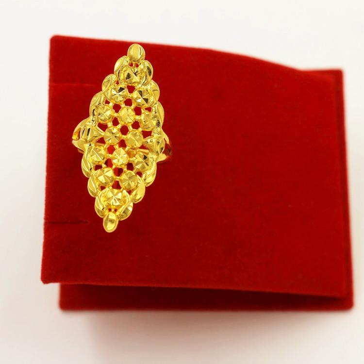 Adjustable Gold Butterfly Ring with Star and Flower Design