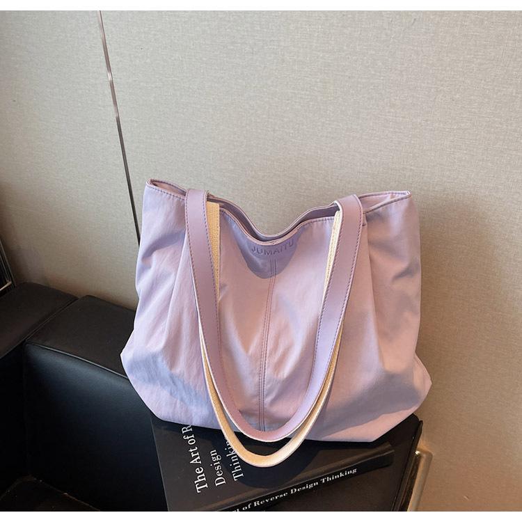 2025 spring and summer large-capacity canvas bag women's casual shoulder bag simple contrasting color versatile niche tote bag