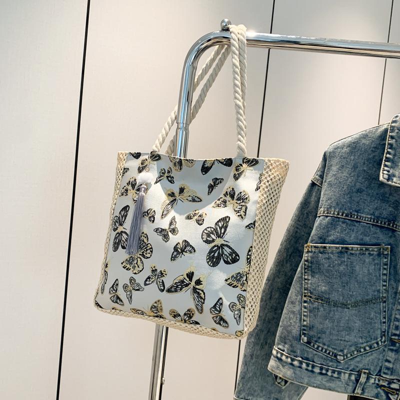 New Beautiful and Personalized Casual Commuting Tote Bag Simple Large Capacity Bag Women's Summer New Chinese Shoulder Bag