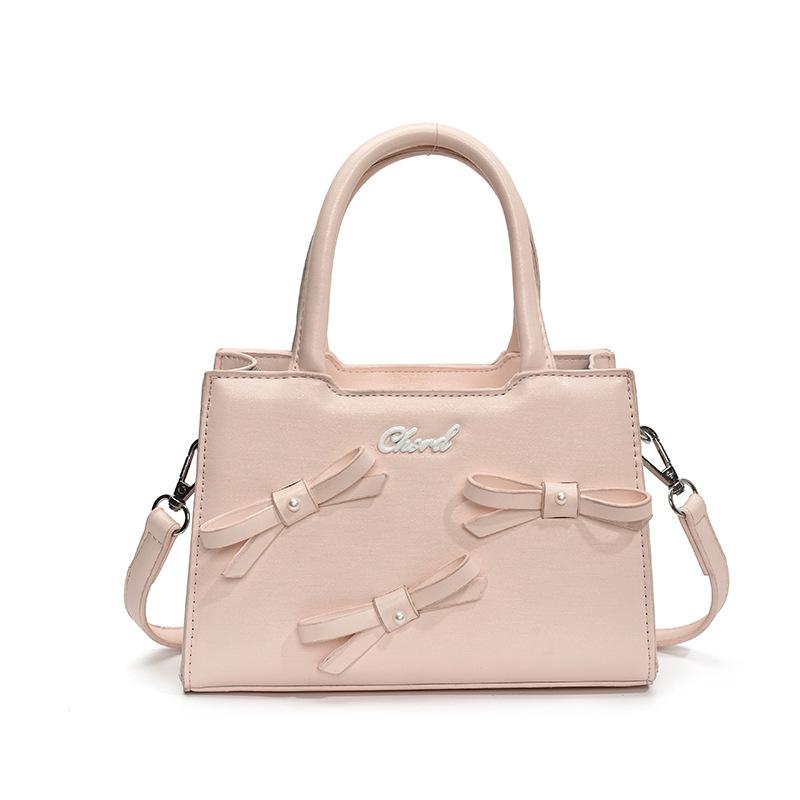 Korean version of bow small square bag women's 2025 summer new simple and fashionable handheld women's bag women's shoulder oblique span bag