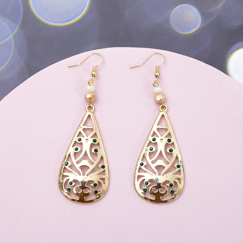 Retro Teardrop Earrings with Hollow Floral Design and Rhinestone Accents