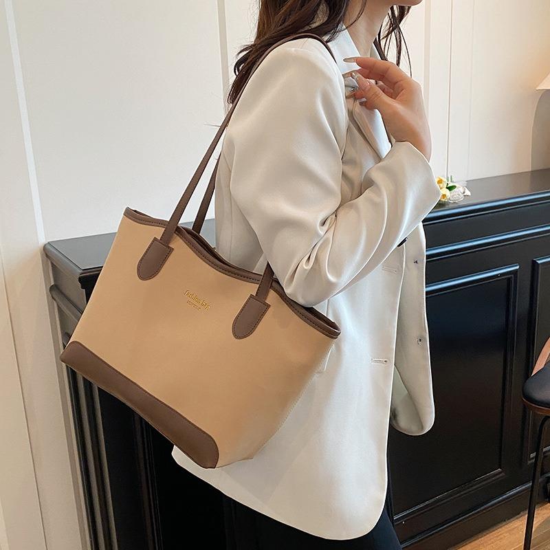 Simple and popular bucket bag women's bag new fashionable versatile commuter large-capacity tote shoulder bag