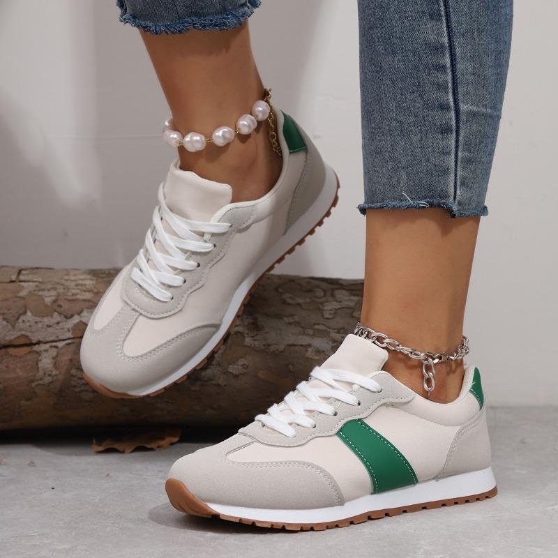Autumn and winter new large size fashion casual temperament flat bottom lace-up color matching outside casual shoes women