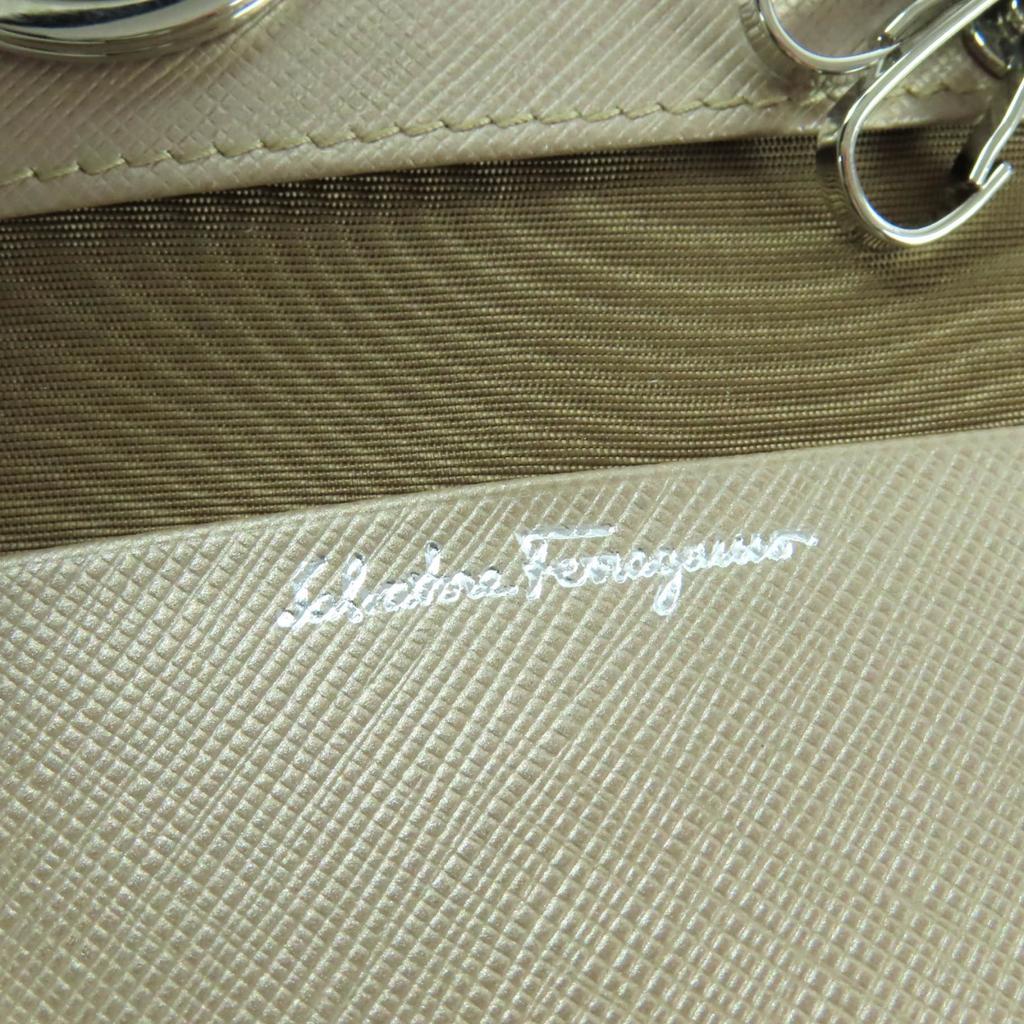 Excellent Porte-clés Salvatore Ferragamo Cuir Doré Champagne Femme 224627 Occasion