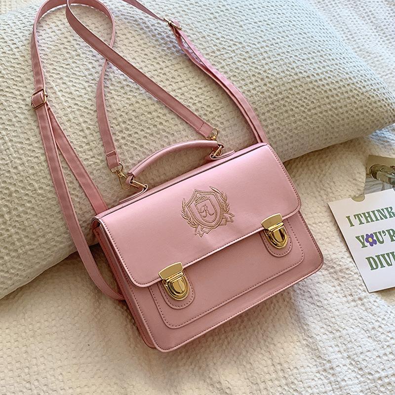 

Retro fashion lock messenger bag 2025 spring new versatile ins women s backpack shoulder small square bag women рожевий