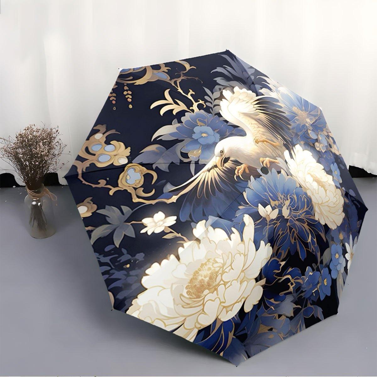 

Folding Umbrella The umbrella features a crane, large white peonies, and blue blossoms against a dark background. Fits Travel, (as the picture,Iron&8K)