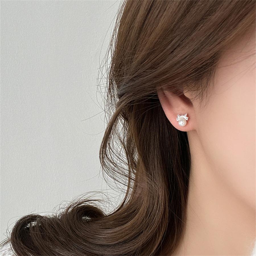 Bow pearl stud earrings 925 silver fashion niche design earrings light luxury temperament sweet earrings