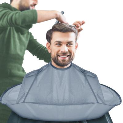 Wiederverwendbare Kinder-Haarschnitt-Umhang Faltbare Haarfänger-Schürze mit eingebauten Werkzeugen Friseur-Haarschneideumhang für Friseure Babyzubehör