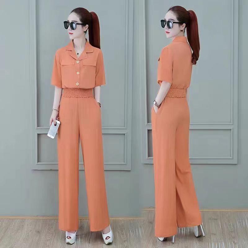 

Женский летний модный костюм: Комплект из двух предметов: короткий облегающий топ и брюки широкого кроя Medium оранжевый