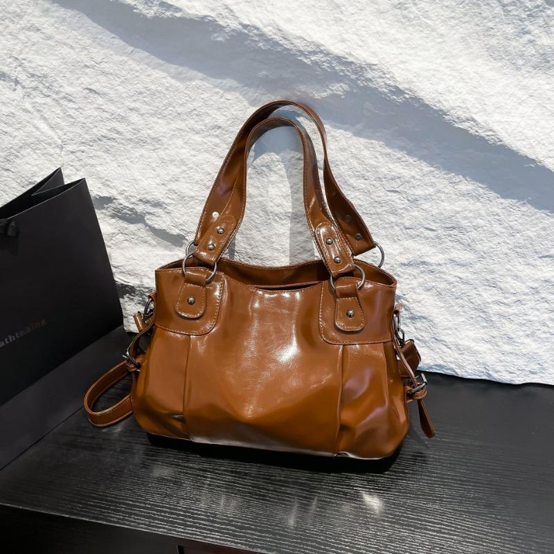 

Retro large-capacity bag, soft leather women s bag, new simple commuter messenger bag, one-shoulder mother tote bag.
