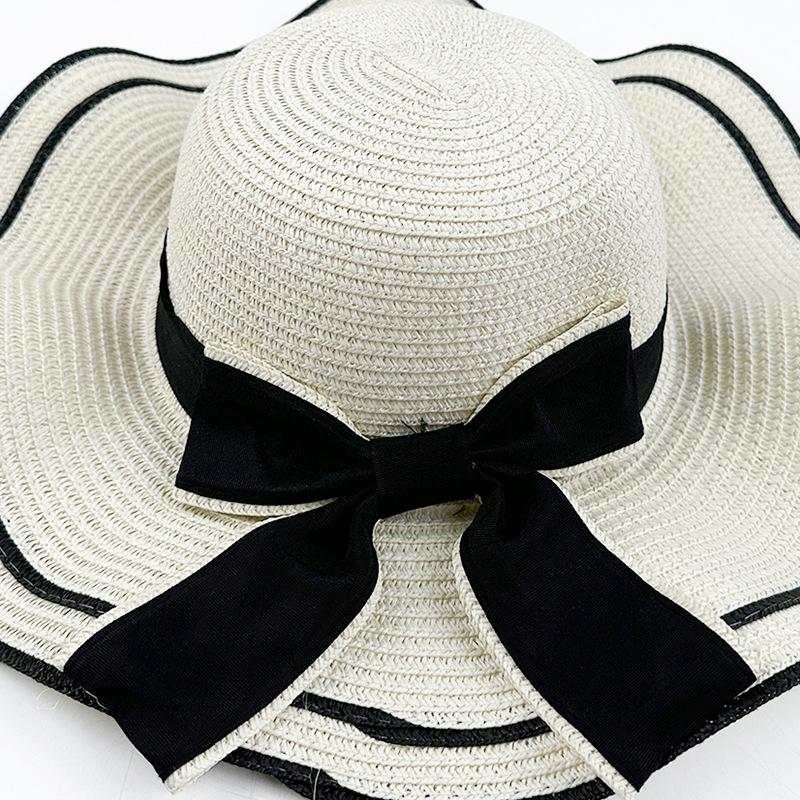 Korean Version of Xiaoxiang Feng Wave Straw Hat Outdoor Big Hat Blade Bow Sun Hat Women's Sunscreen Beach Hat