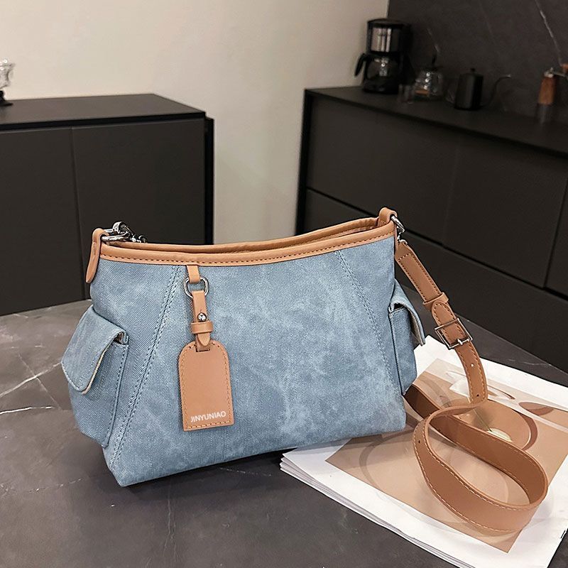 

2025 spring/summer new niche bag commuter armpit bag fashionable texture versatile women s casual shoulder crossbody bag джинсовий синього кольору