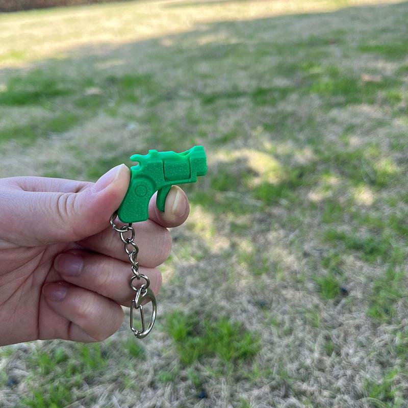 Creative Weapon Mini Gun Model Pendant Keychain  Bag Decoration Stress Relieving Toys Keychain Car Key Rings Gifts